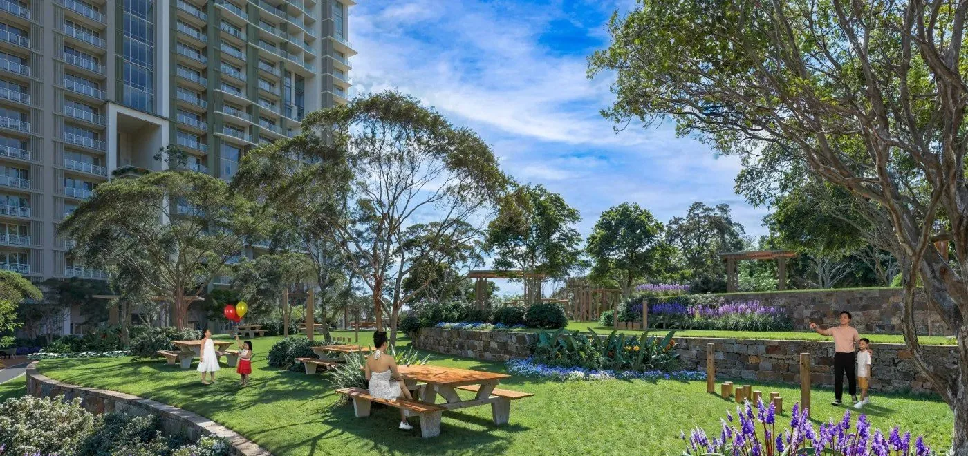 Picnic area with tables and planting at Kalea Heights