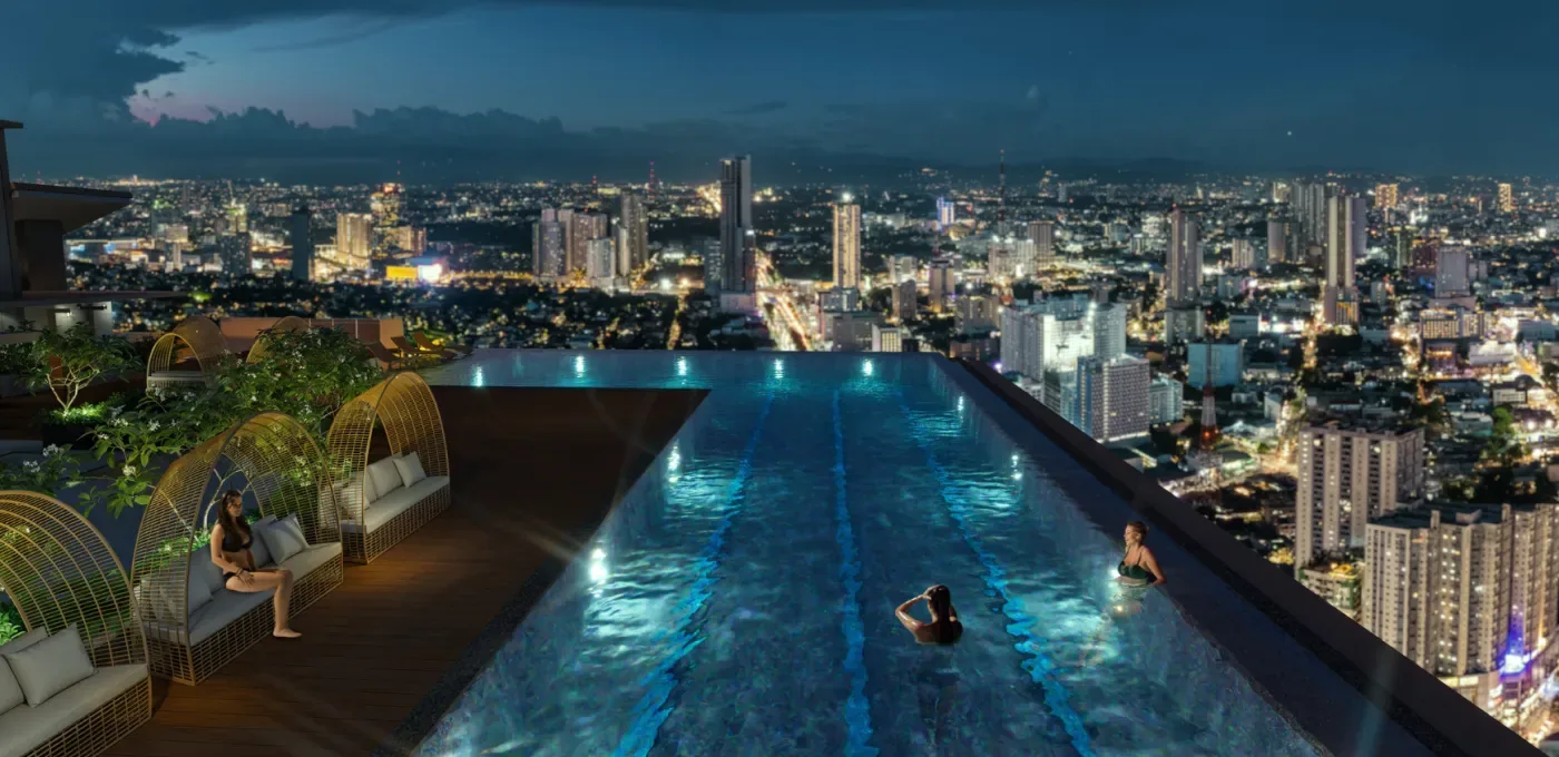 One Delta Terraces sky deck pool at night above the Quezon City skyline