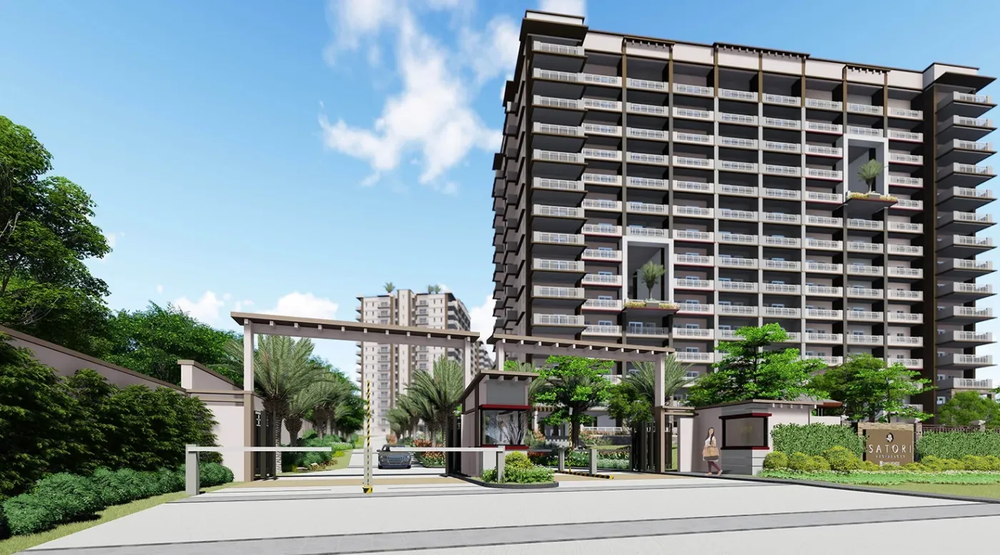 Main entrance gate and driveway at Satori Residences with the Amani building behind